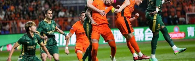 官方网站-单国脚对抗四国脚 玉昆取中超第一分如释重负
